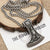 Stainless Steel Wolf Raven Axe Necklace